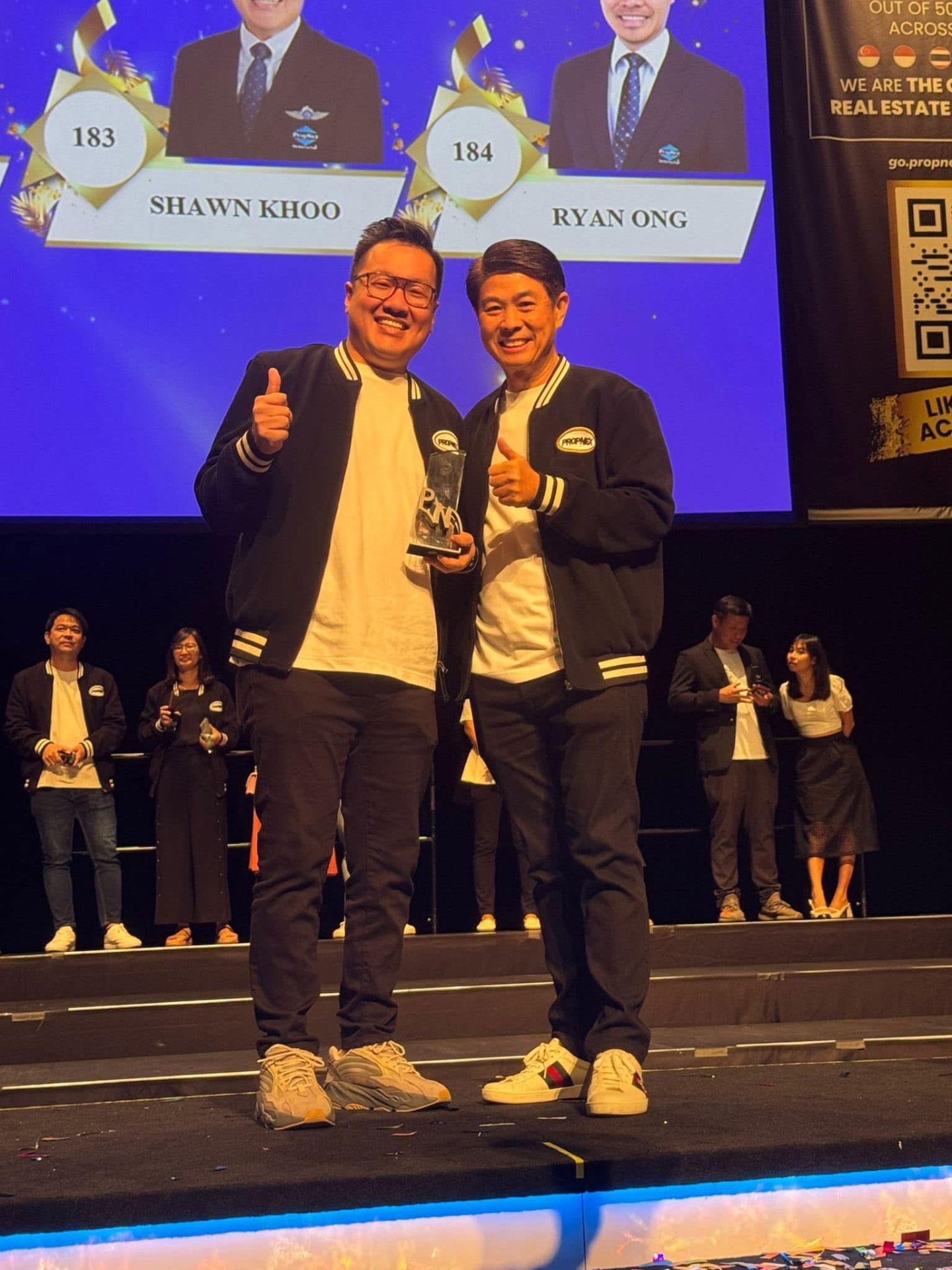 Shawn Khoo with a fellow top producer at a PropNex awards night